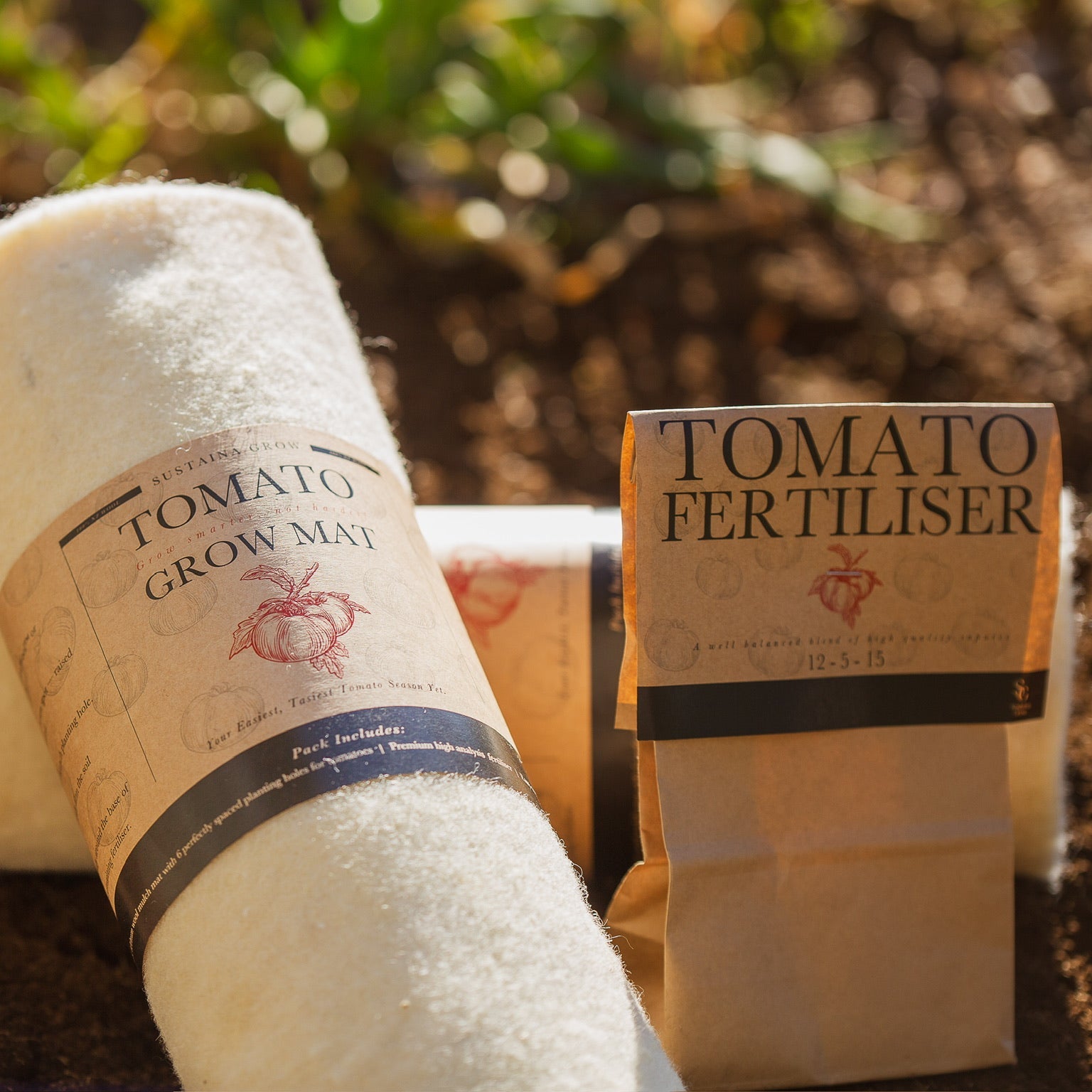Tomato grow may and tomato fertiliser packaging on a natural background
