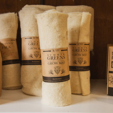 A wool mulch mat to grow summer greens / salads 